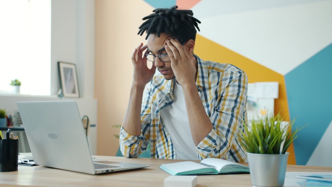 worried professional at desk